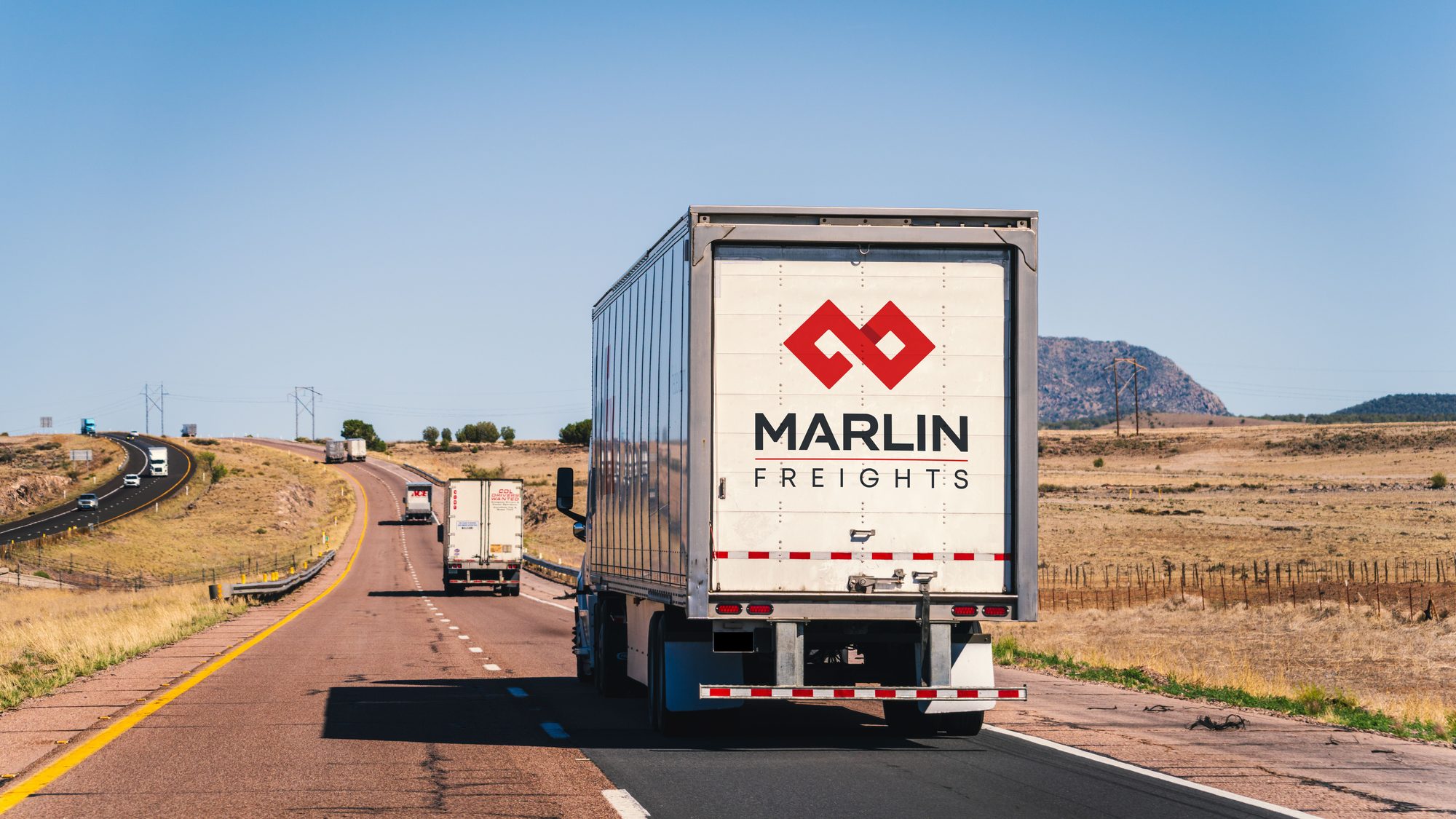 A Marlin Freights truck on the interstate